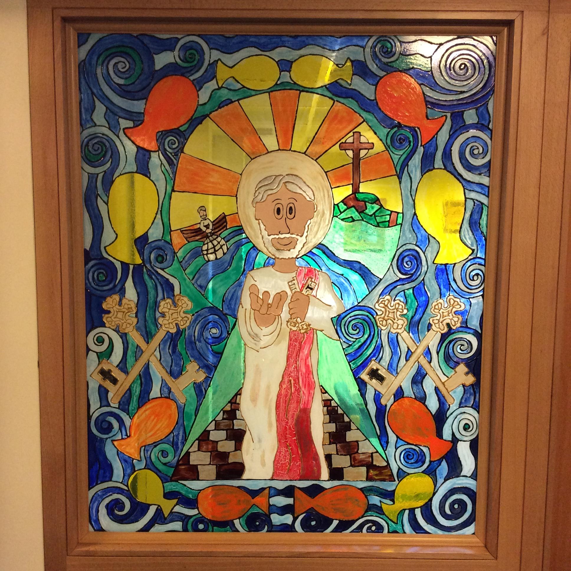 Our St. Peter stained glass window is in the school entrance to welcome everyone.